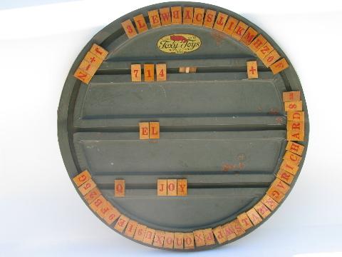 photo of antique Foxy tin spelling wheel toy, wood letter tiles, vintage game board #1