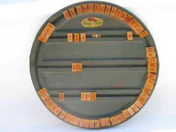 catalog photo of antique Foxy tin spelling wheel toy, wood letter tiles, vintage game board