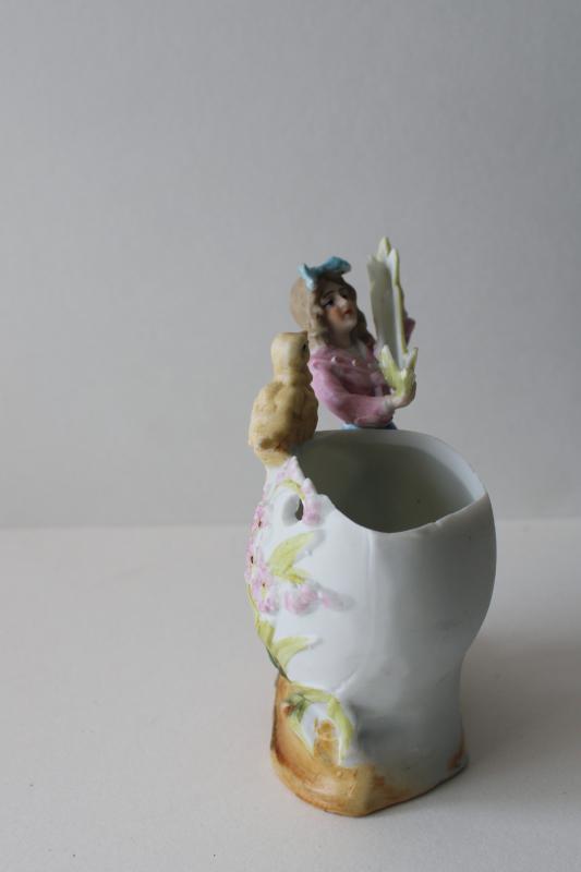 photo of antique German bisque china figurine Easter egg w/ baby chick girl holding garland #1