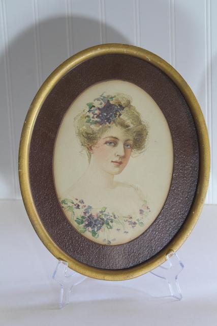 photo of antique Gibson girl style lady portrait prints in period vintage oval frames #2