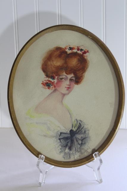 photo of antique Gibson girl style lady portrait prints in period vintage oval frames #3