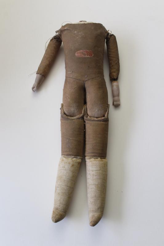 photo of antique Victorian era doll body, leather look canvas cloth w/ china hands painted boots #1