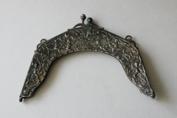 catalog photo of antique Victorian purse frame, ornate embossed nickel silver metal w/ cherubs, needs repair 
