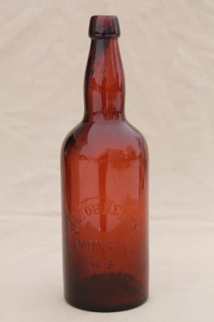 photo of antique amber brown glass beer bottle embossed Jacob Hefty Monroe Wisconsin brewery #1