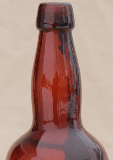 photo of antique amber brown glass beer bottle embossed Jacob Hefty Monroe Wisconsin brewery #6