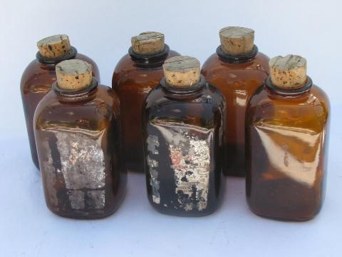 photo of antique amber brown glass snuff bottles, remains of original old labels #1