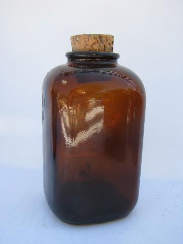 photo of antique amber brown glass snuff bottles, remains of original old labels #4