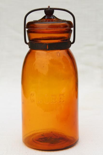 photo of antique amber glass bottle Globe fruit canning jar w/ wire bail lid vintage 1886 patent date #1