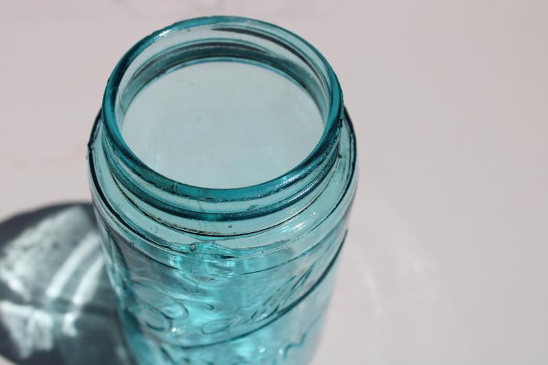 photo of antique aqua blue glass one pint size jar Ball Mason with triple L script lettering #2