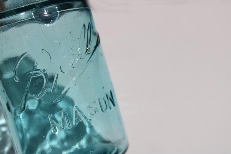 photo of antique aqua blue glass one pint size jar Ball Mason with triple L script lettering #3