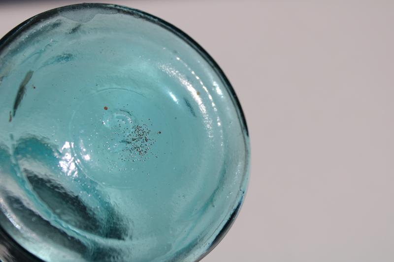 photo of antique aqua blue glass one pint size jar Ball Mason with triple L script lettering #4