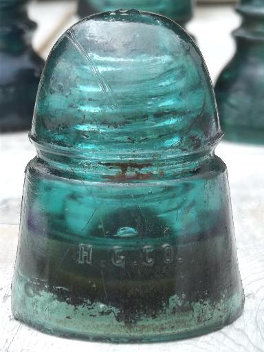 photo of antique aqua blue green glass telegraph or electrical insulators #5