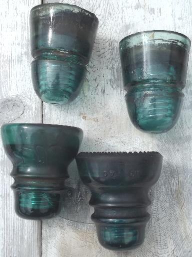 photo of antique aqua blue green glass telegraph or electrical insulators #7