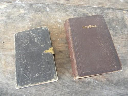 photo of antique bibles, 1800s pocket sized embossed leather covers,brass clasp #1