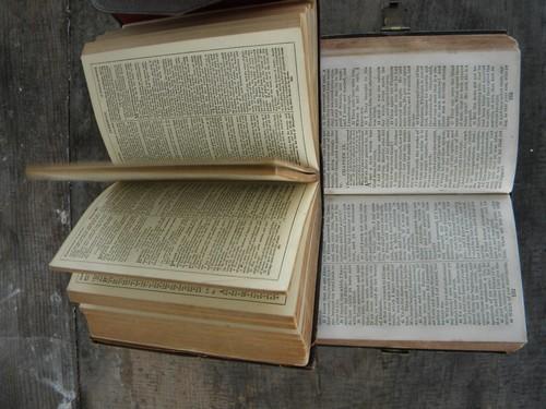 photo of antique bibles, 1800s pocket sized embossed leather covers,brass clasp #5