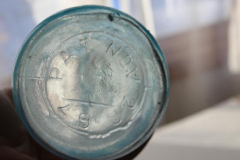 photo of antique blue green glass Mason jar, embossed 1858 Mason's cross & 1867 patent date #3