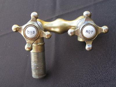 photo of antique brass and china faucet taps #1