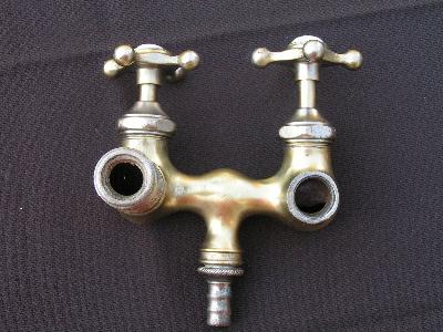 photo of antique brass and china faucet taps #2