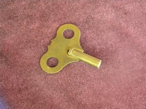 photo of antique brass key for wind-up tall case, grandfather or cuckoo clock #1