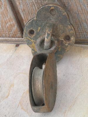 photo of antique brass laundry line pulley, vintage garden #1