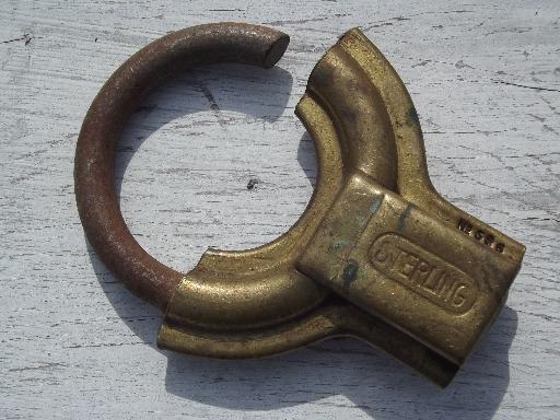 photo of antique brass padlock, Old brass circular padlock Sterling Lock Co, Minn #1