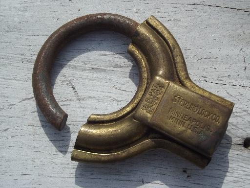 photo of antique brass padlock, Old brass circular padlock Sterling Lock Co, Minn #2