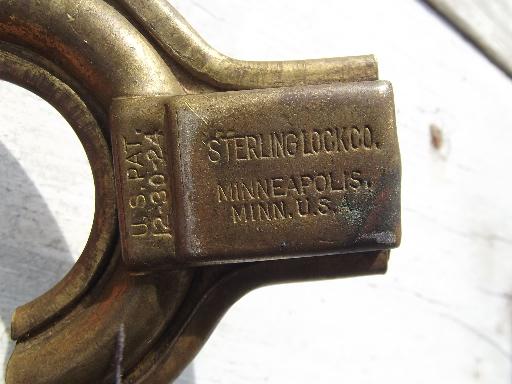 photo of antique brass padlock, Old brass circular padlock Sterling Lock Co, Minn #5