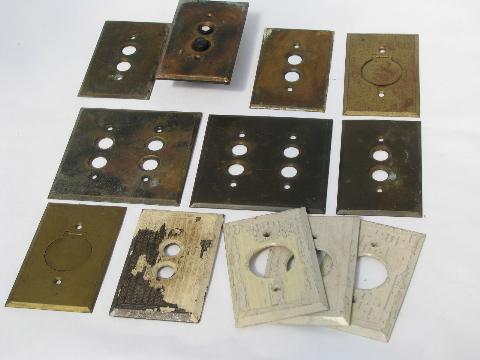 photo of antique brass push-button light switch plates, vintage electrical lot #1