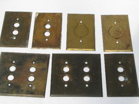 photo of antique brass push-button light switch plates, vintage electrical lot #2