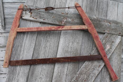 photo of antique buck saw, wood frame hand saw w/ 28