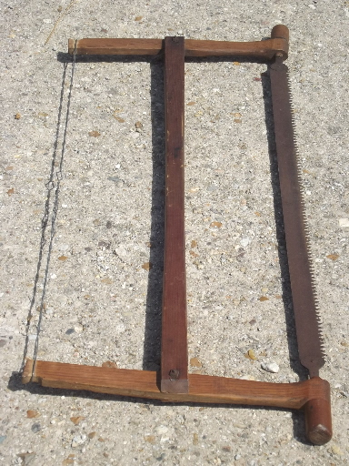 photo of antique buck saw, wood frame hand saw w/ 34