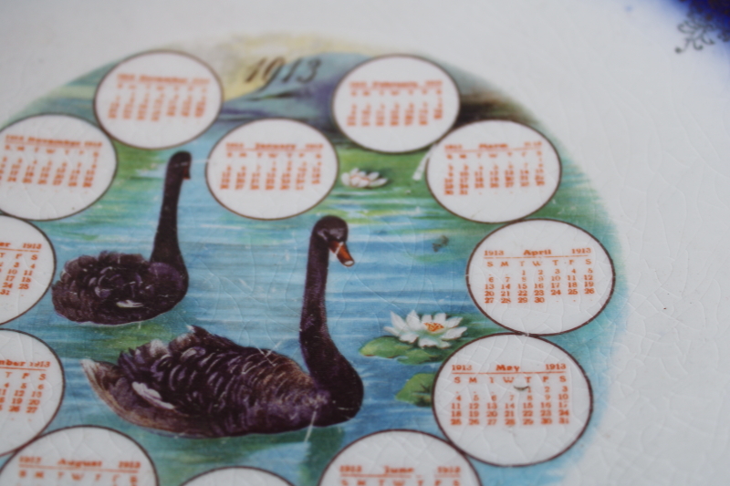 photo of antique calendar plate from 1913 Manawa Wisconsin, black swans w/ flow blue border, shabby stained china  #3