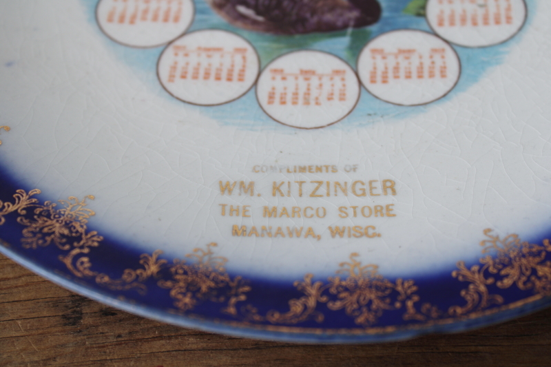 photo of antique calendar plate from 1913 Manawa Wisconsin, black swans w/ flow blue border, shabby stained china  #4