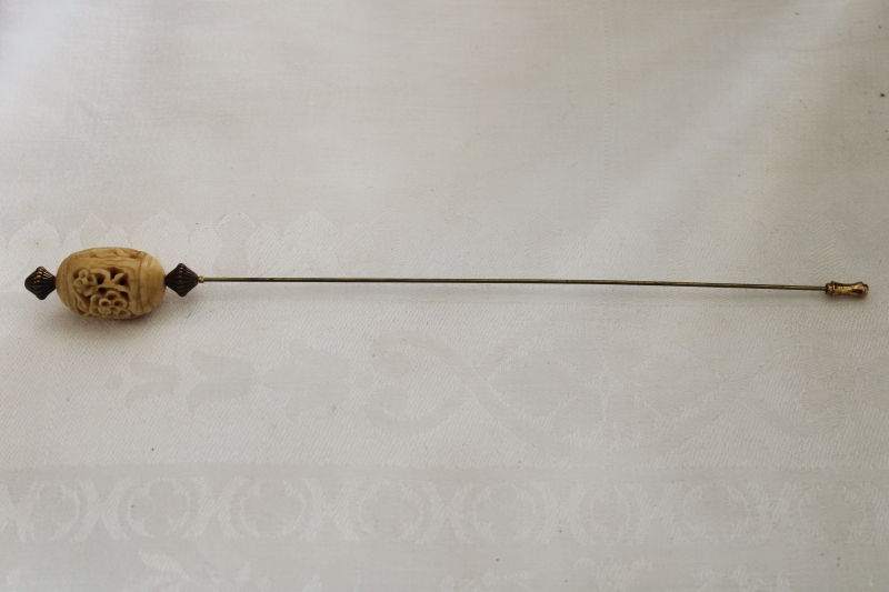 photo of antique carved bone hat pin, long skewer hat pin early 1900s vintage #1