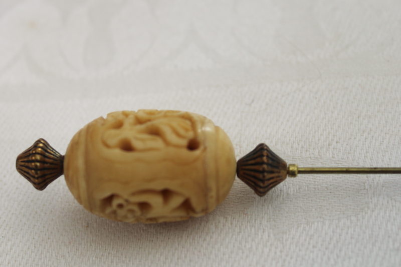 photo of antique carved bone hat pin, long skewer hat pin early 1900s vintage #4