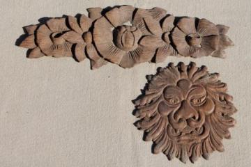 catalog photo of antique carved wood appliques, carved flower garland & embossed lion or dragon face medallion