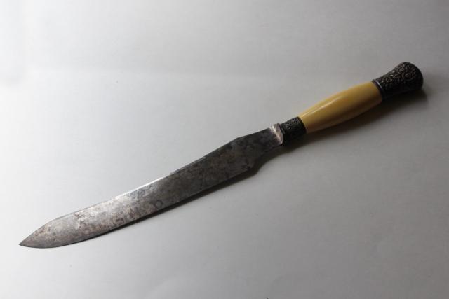 photo of antique carving knife w/ ivory celluloid handle, blade marked Landers Frary Clark #1