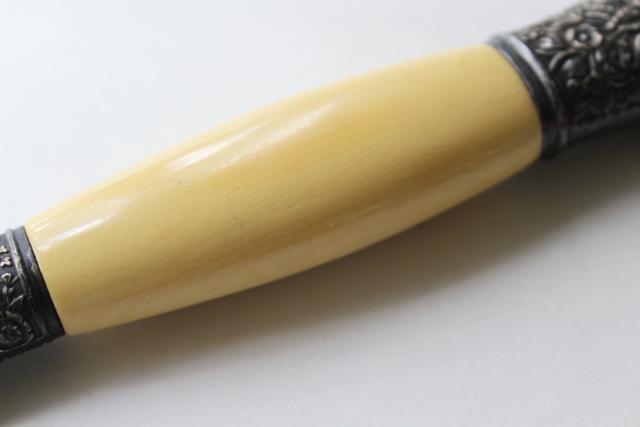 photo of antique carving knife w/ ivory celluloid handle, blade marked Landers Frary Clark #5