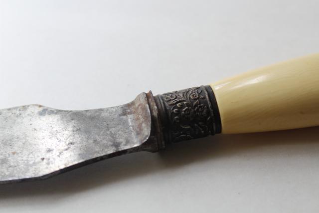 photo of antique carving knife w/ ivory celluloid handle, blade marked Landers Frary Clark #7