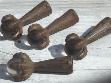 catalog photo of antique cast iron ball & claw foot feet set, Victorian era piano stool feet