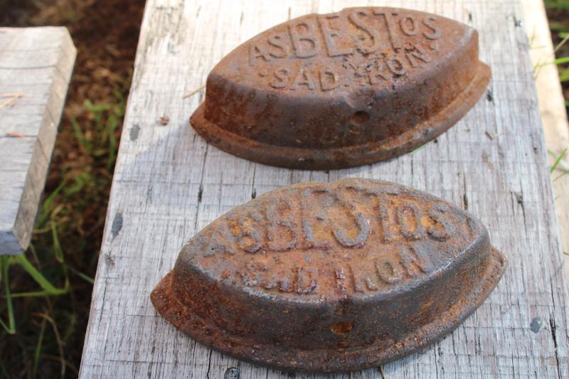 photo of antique cast iron sadirons, Asbestos brand irons, rusty junk primitive door stops #3