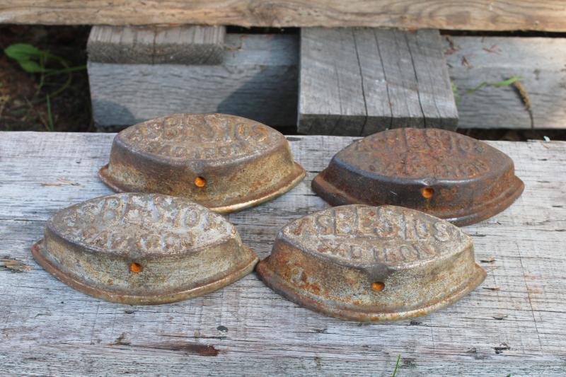 photo of antique cast iron sadirons, Asbestos brand irons, rusty junk primitive door stops #1