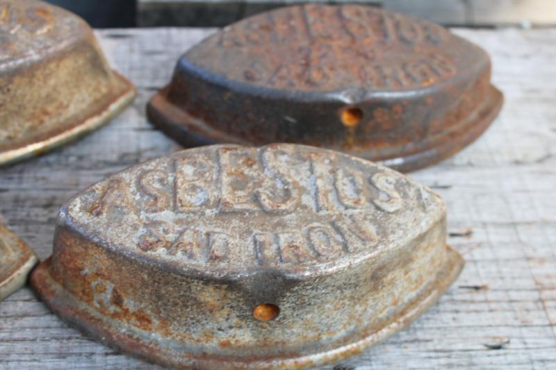 photo of antique cast iron sadirons, Asbestos brand irons, rusty junk primitive door stops #2