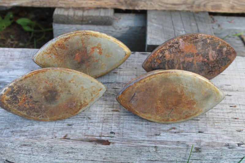 photo of antique cast iron sadirons, Asbestos brand irons, rusty junk primitive door stops #5