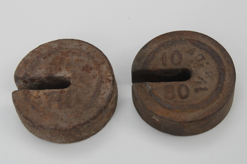 photo of antique cast iron scale weights, large round weights rusty crusty vintage farm primitives #1