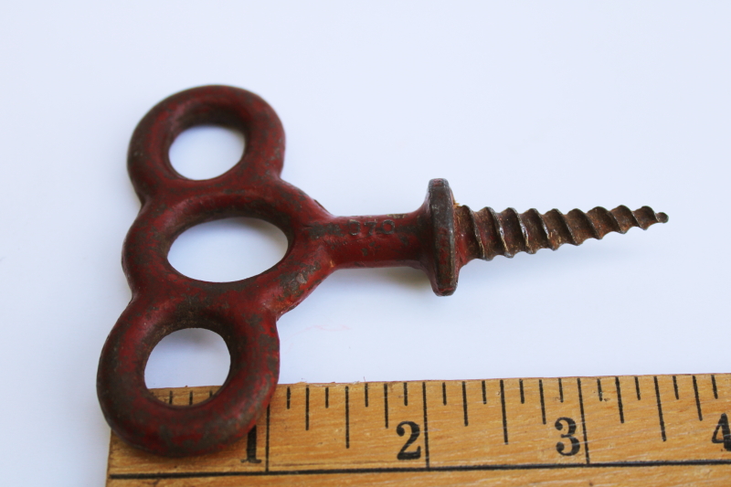 photo of antique cast iron stage screw, D S Co turn of the century vintage hardware #2