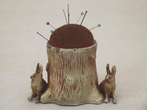 photo of antique cast metal 'bronze' figural pincushion w/ tree stump & rabbits #1