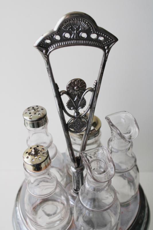 photo of antique castor set w/ original glass jars & bottles, aesthetic art metal stand #10