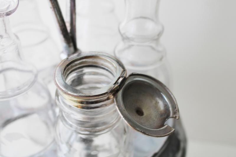 photo of antique castor set w/ original glass jars & bottles, aesthetic art metal stand #13