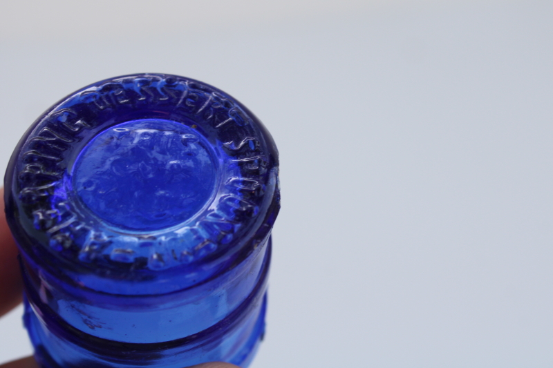 photo of antique cobalt blue glass medicine dose cup measure from Wyeth pharmacy bottle #2
